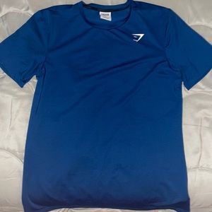 Slim fitting tee for the gains. Teal color